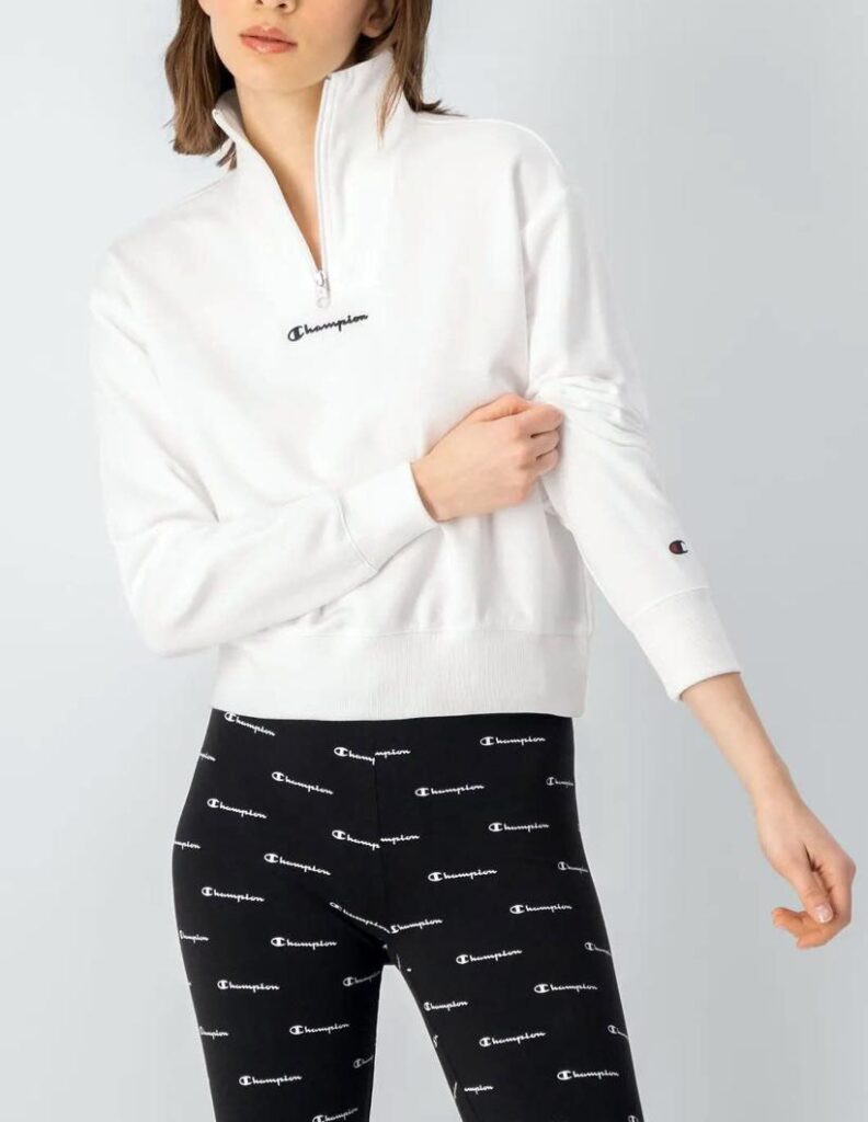 women's white pullover and black pants