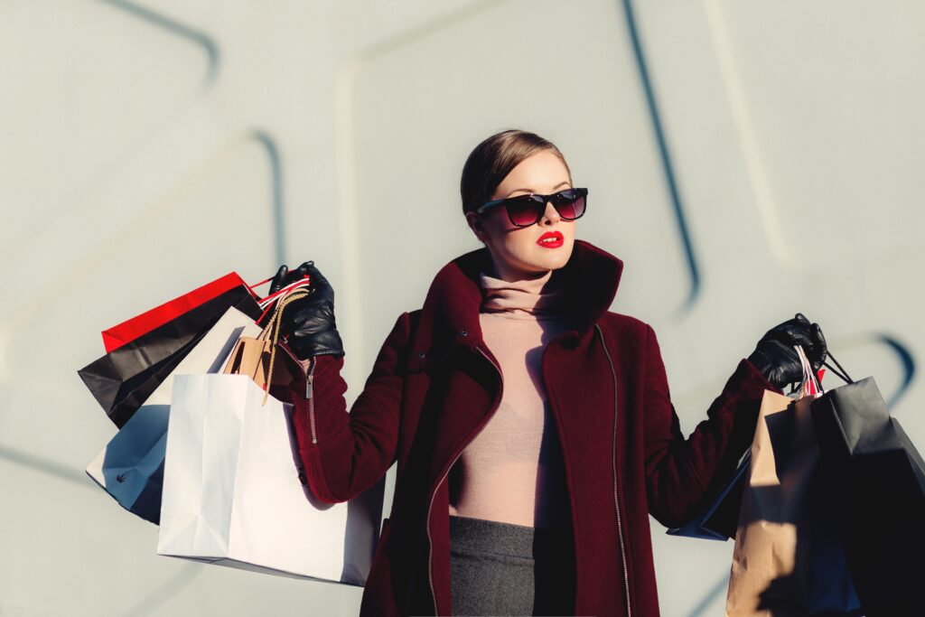 Woman shopping, holding shopping bags
